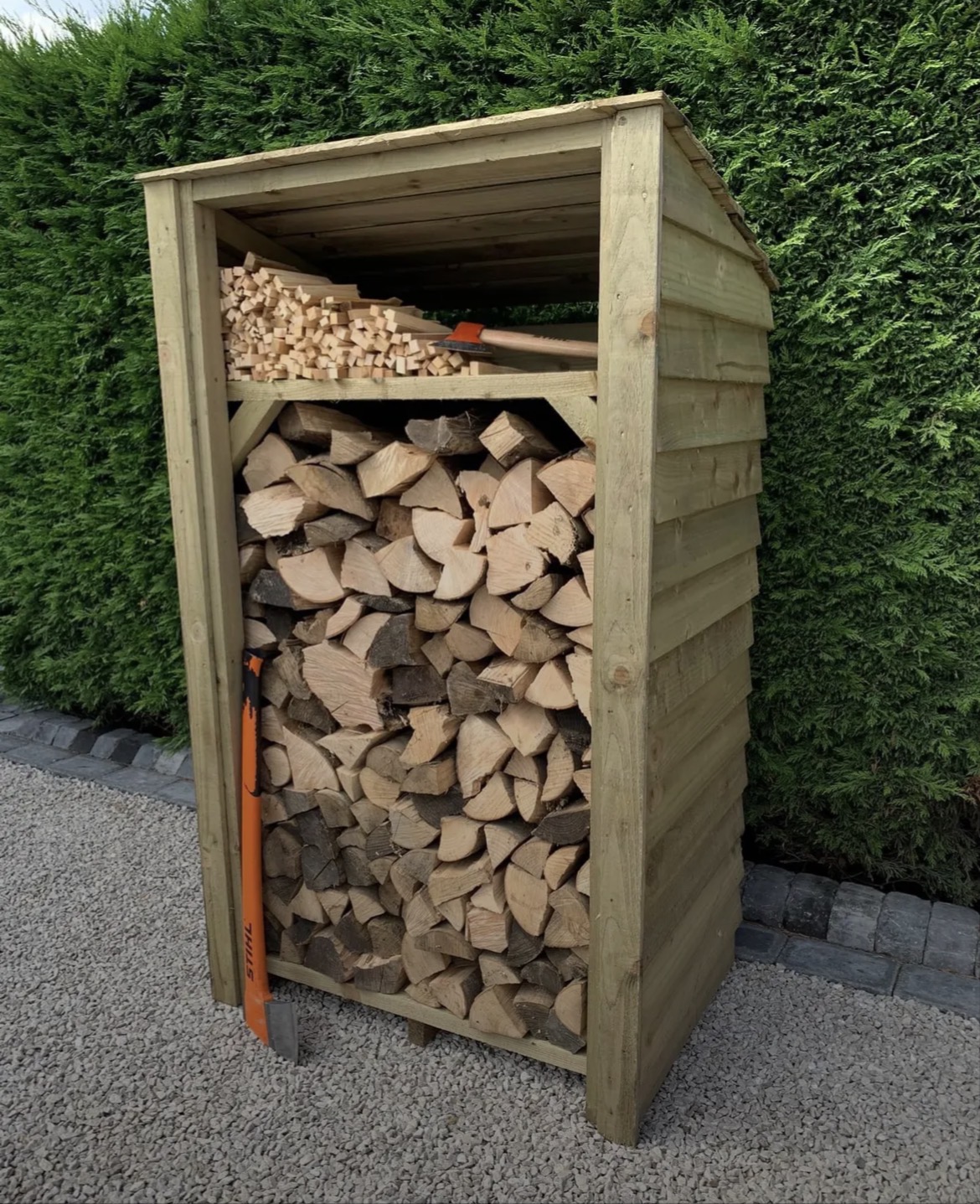 Kingswood timber log store with a separate kindling shelf